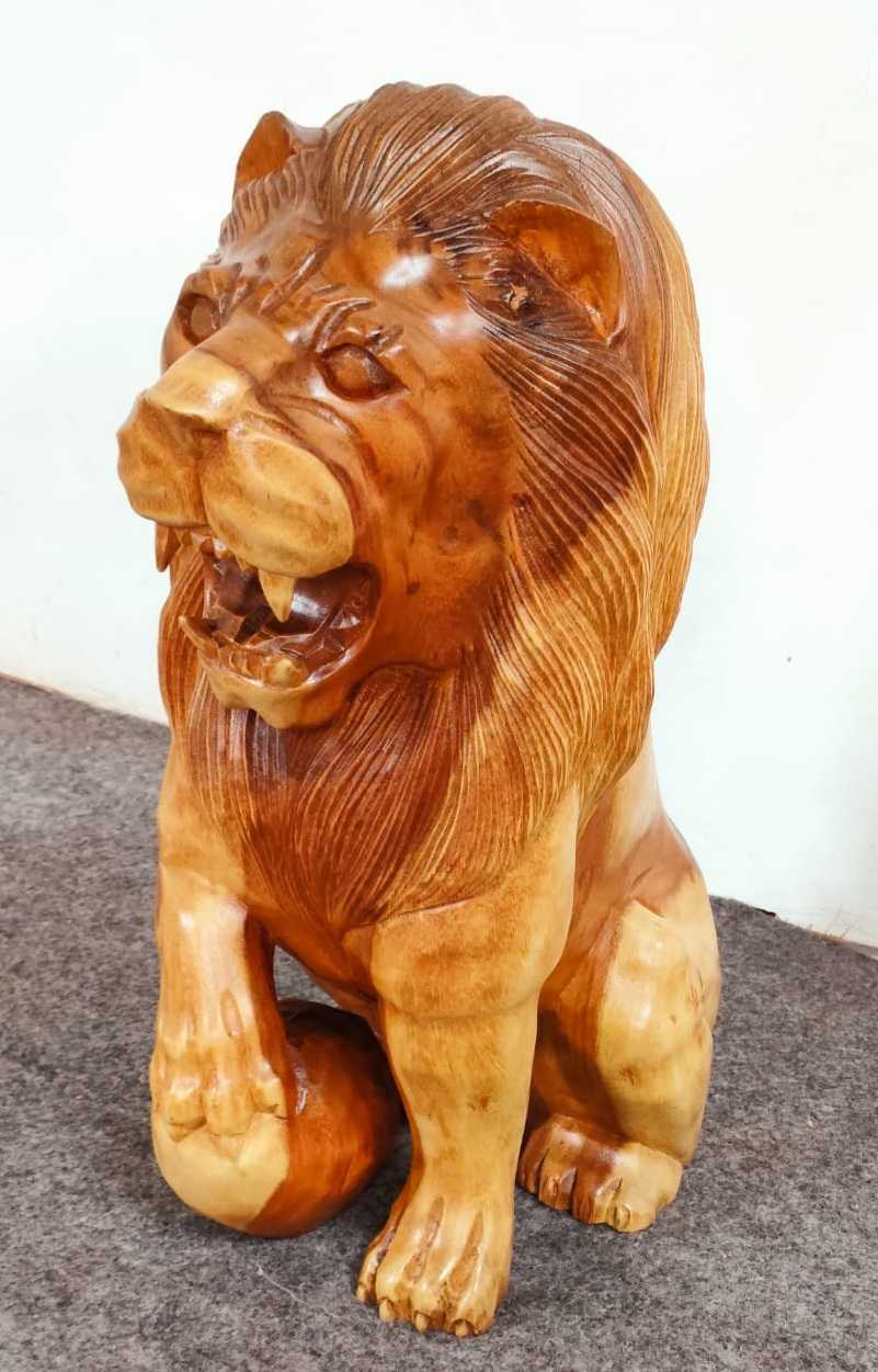 CARVED WOODEN LION STATUE