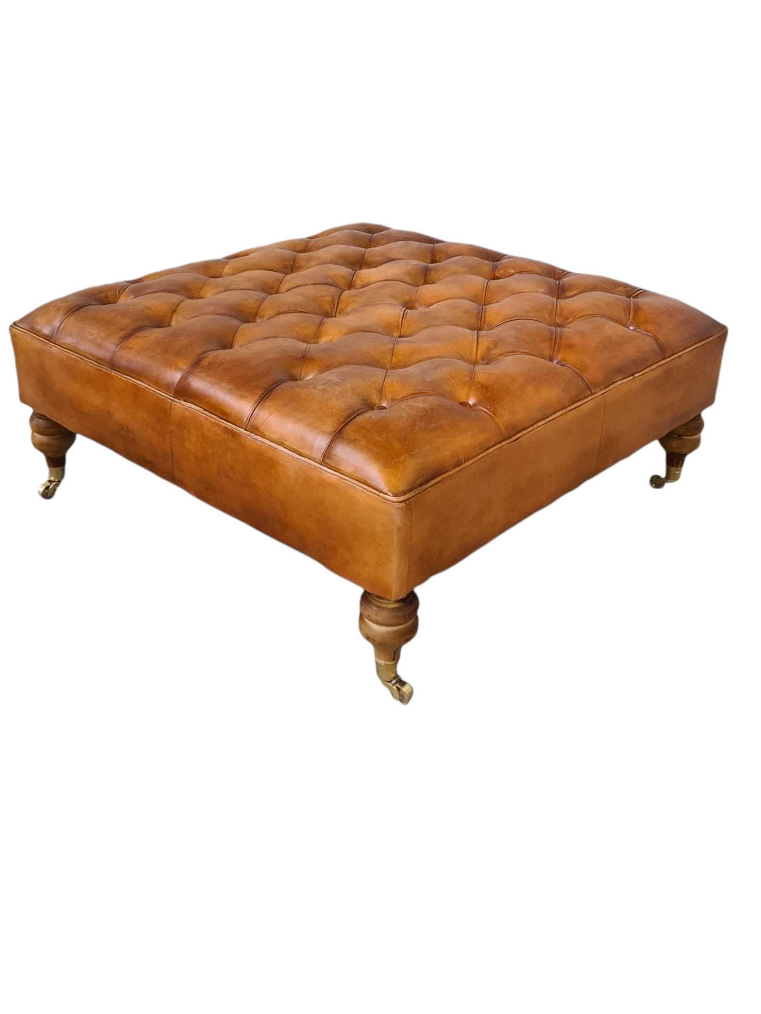 Austin LEATHER OTTOMAN WITH BRASS WHEELS