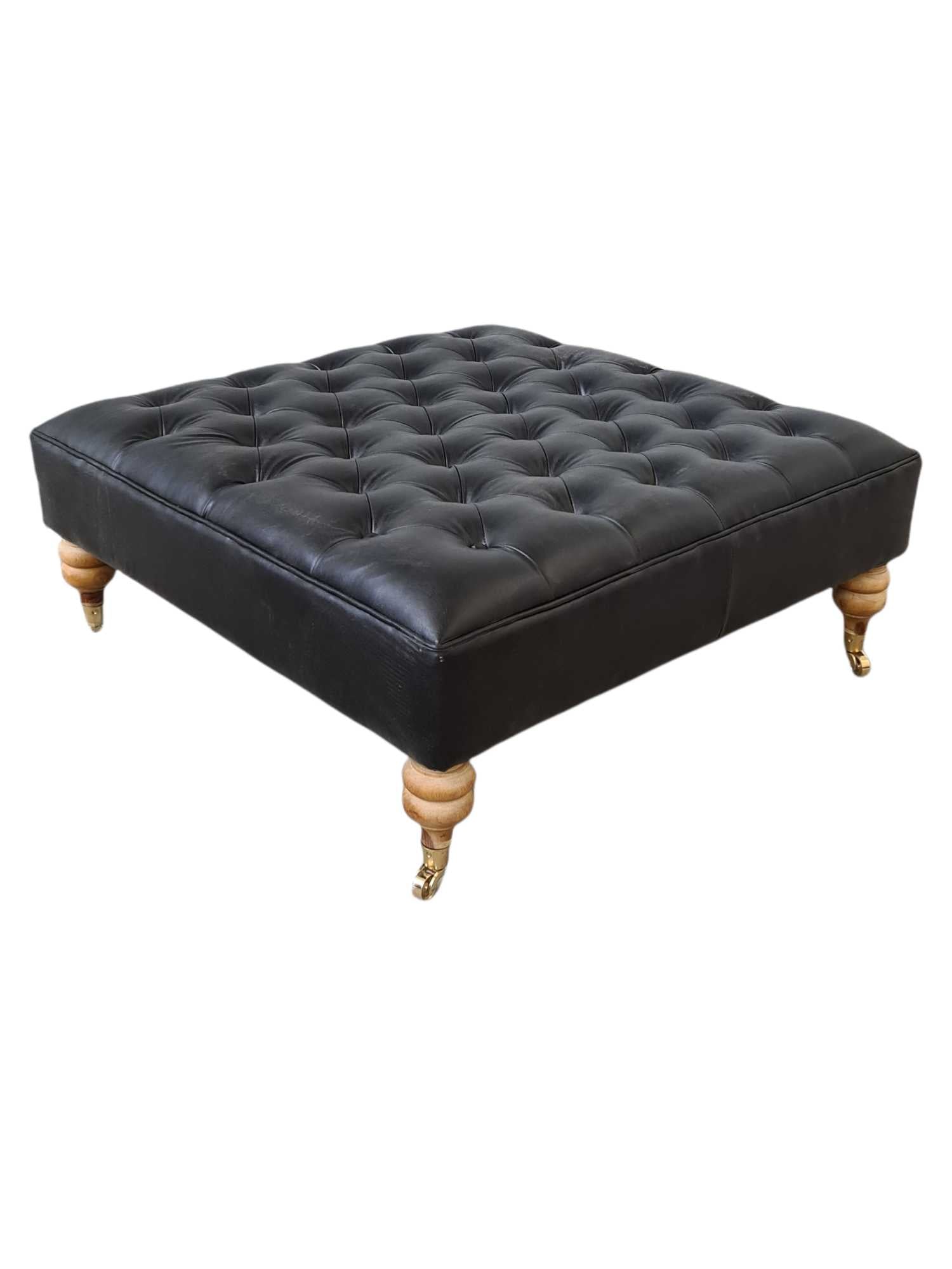 Austin LEATHER OTTOMAN WITH BRASS WHEELS
