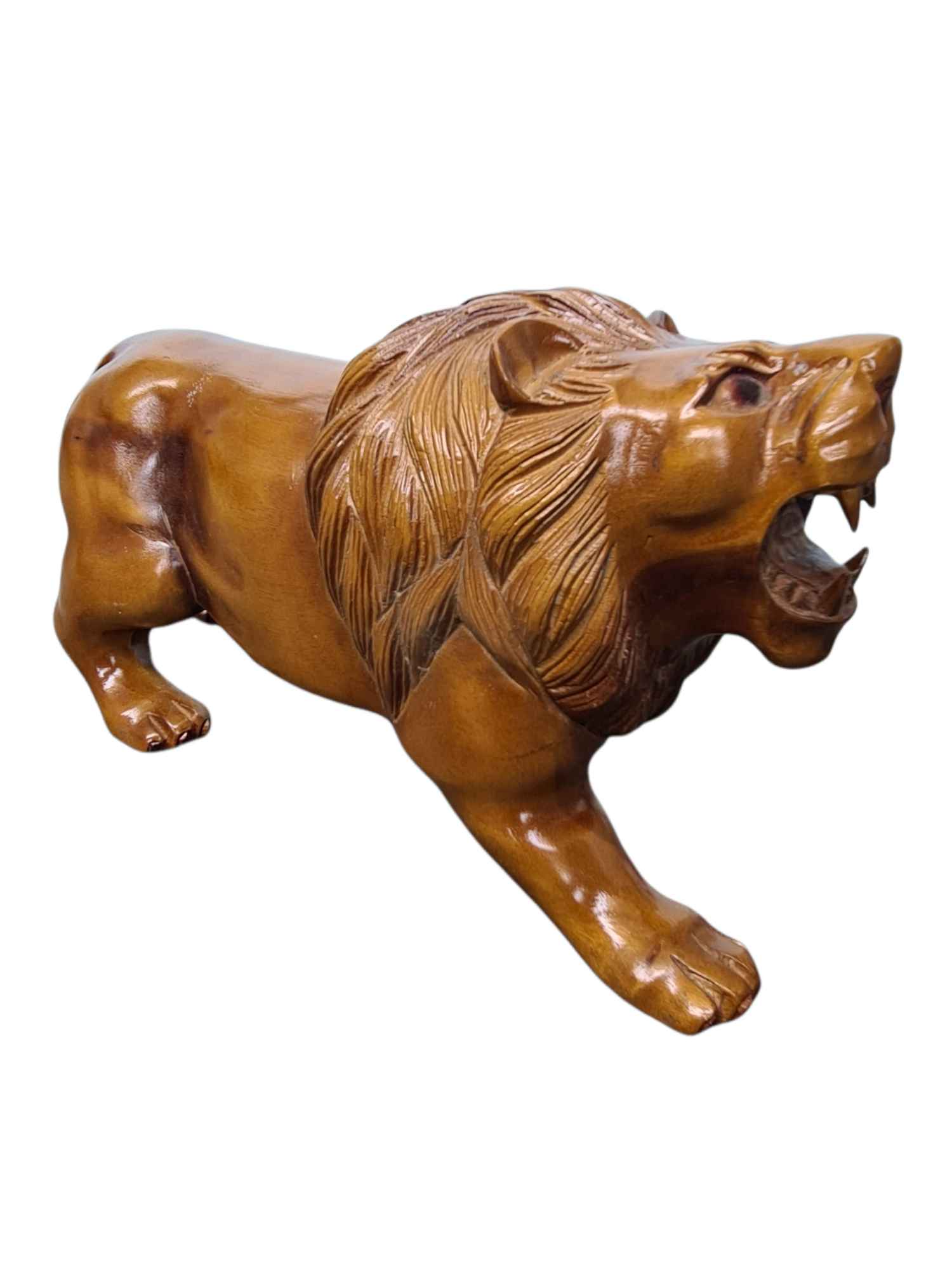 WOODEN LION STATUE