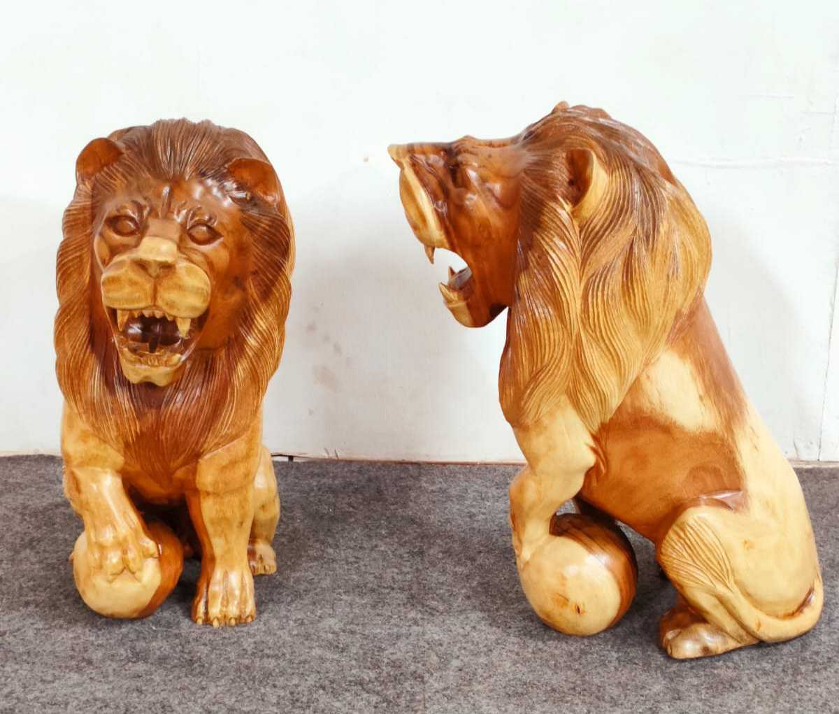 CARVED WOODEN LION STATUE