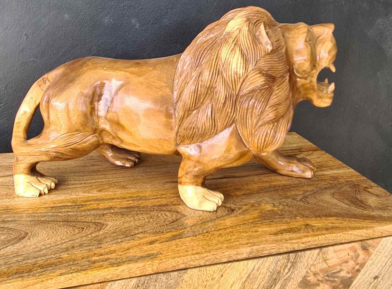 WOODEN LION STATUE