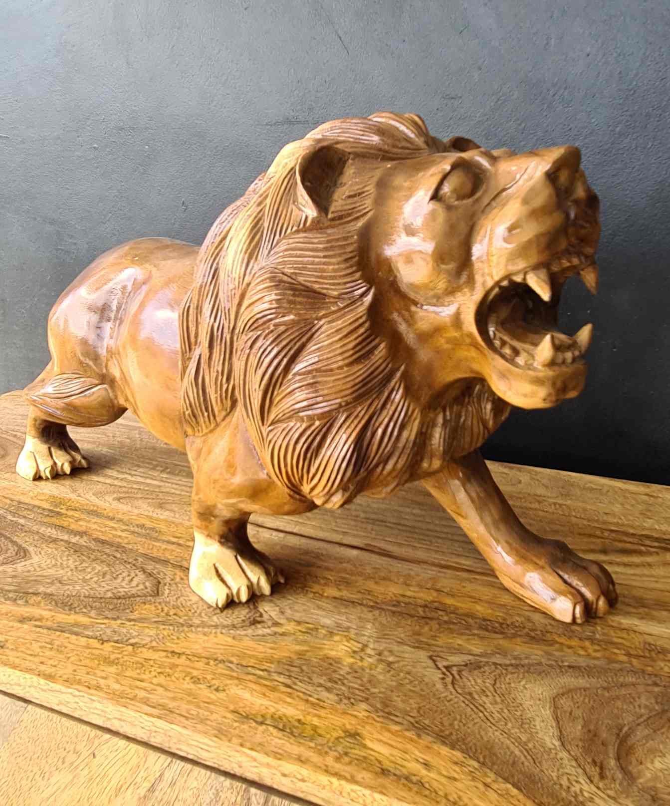 WOODEN LION STATUE