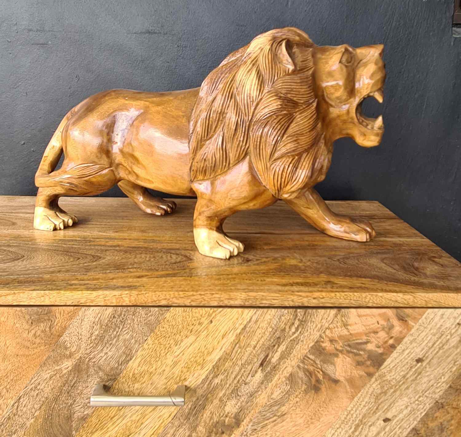 WOODEN LION STATUE